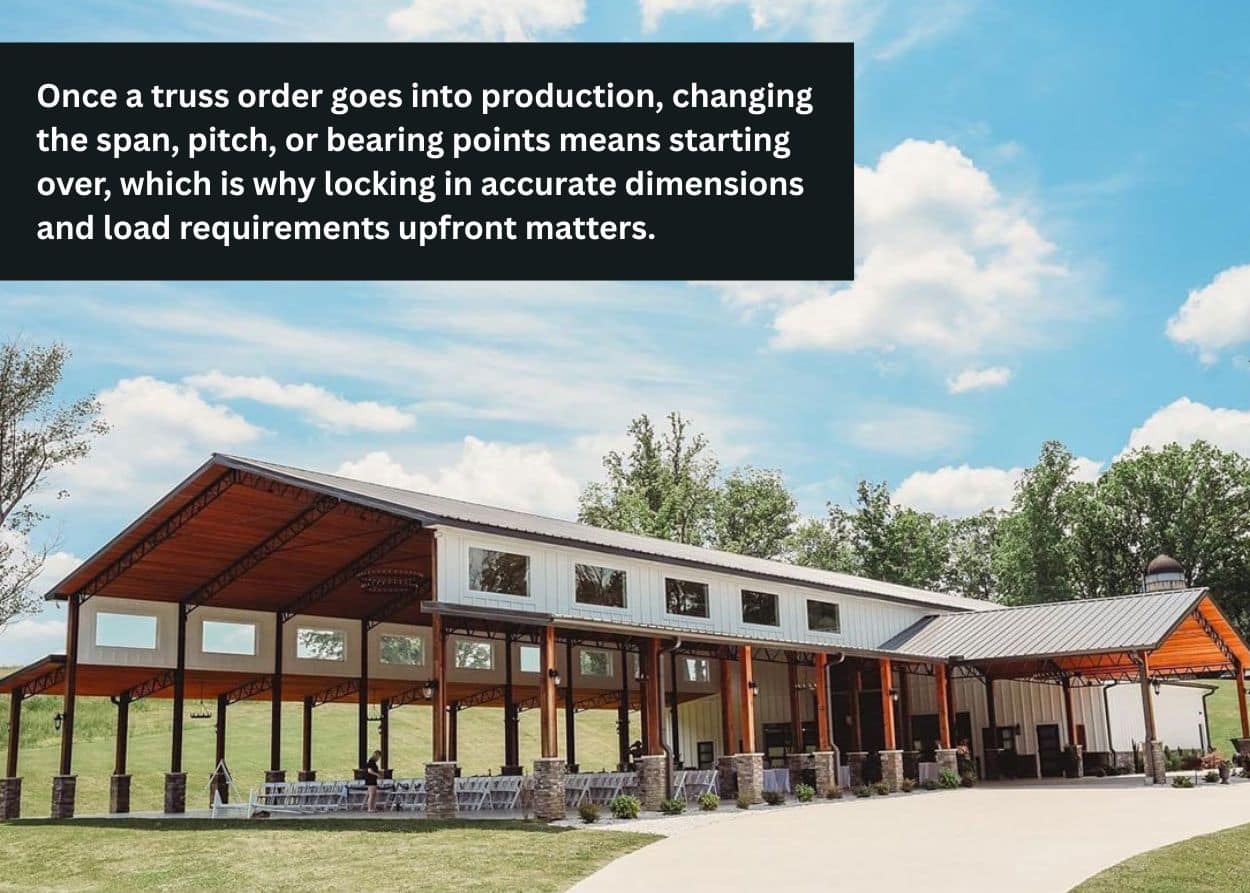 Completed post-frame building supported by custom steel trusses for a durable, open-span commercial or agricultural structure.