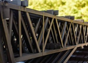 Proper jobsite storage protects steel trusses from moisture, bending, and unnecessary handling. Follow these seven best practices to keep your trusses ready for installation.